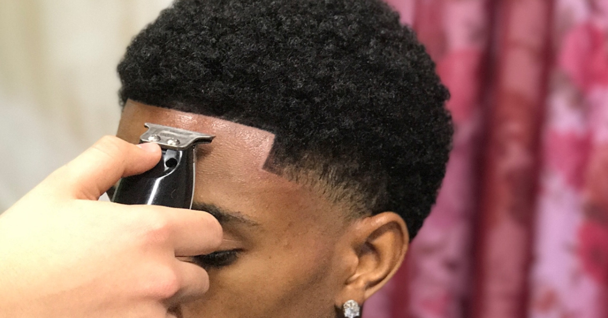 What Is a Blowout Low Taper Fade Curly Hair Style?